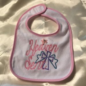Baby bib; embroidered Heaven Sent; pink